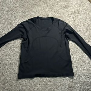 Black Lululemon swiftly